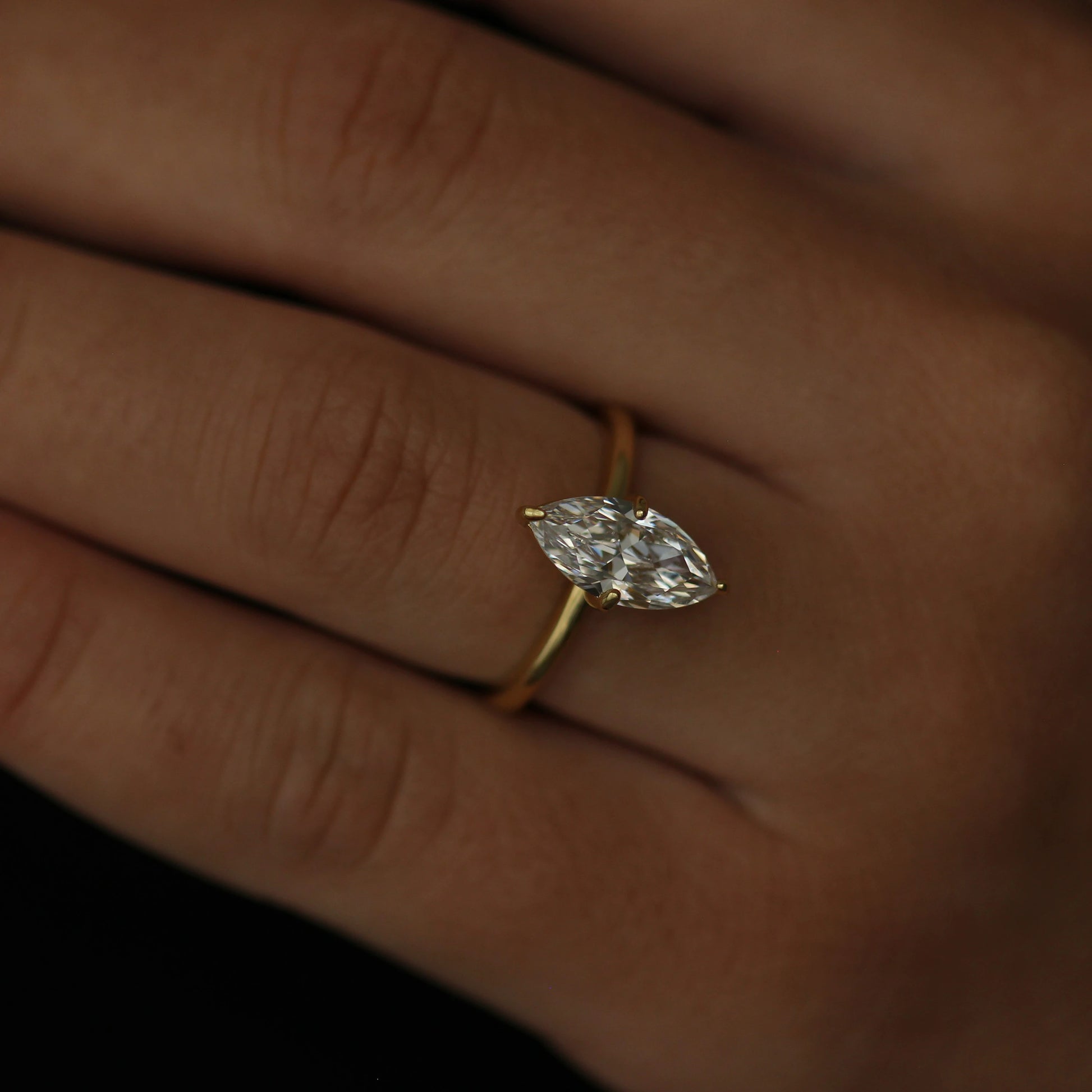 Cubic zirconia marquise gold ring solitaire