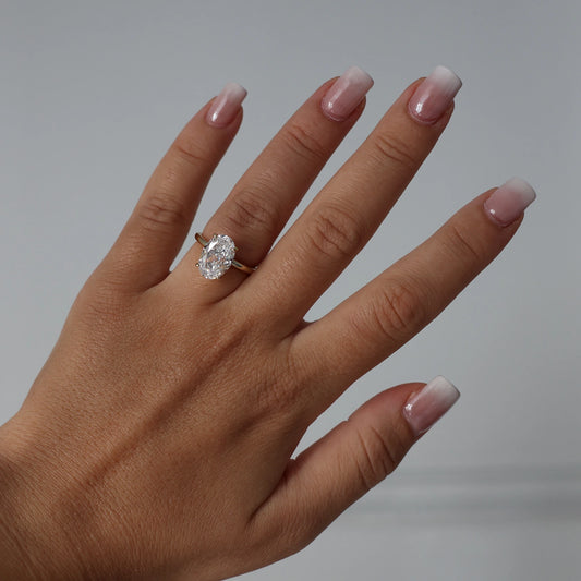 14k gold oval ring on hand