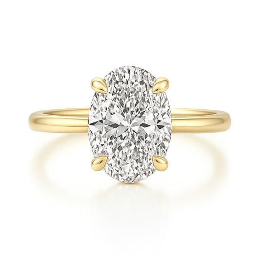 14k gold oval ring on white background