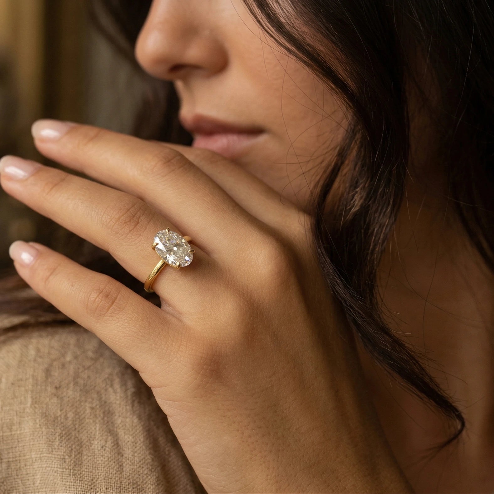 3.5 carat elongated oval cut cubic zirconia ring set in an 18k gold plated