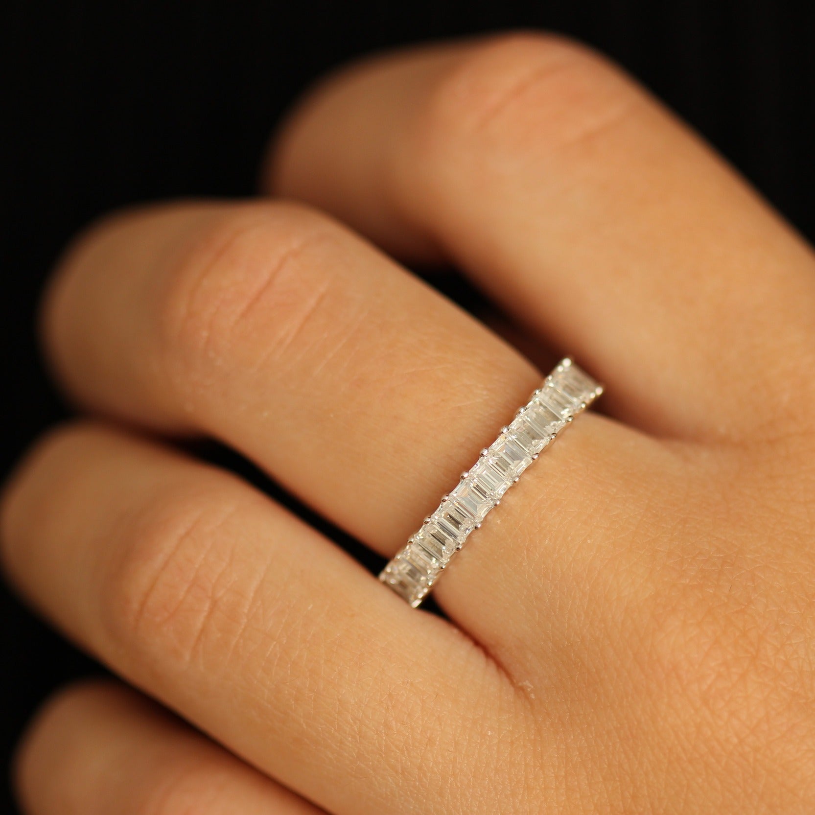 3mm cubic zirconia emerald eternity band on hand