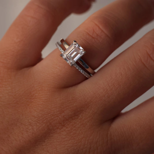 2ct emerald cut moissanite ring with silver band