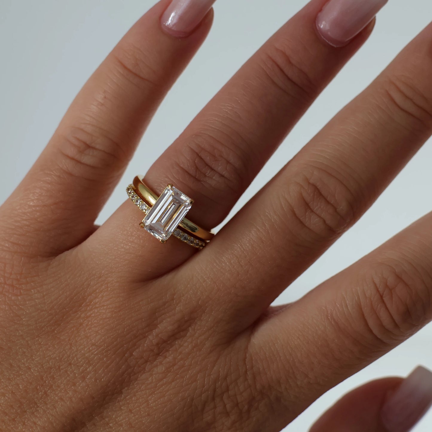Gold 3 carat elongated emerald cut cubic zirconia ring