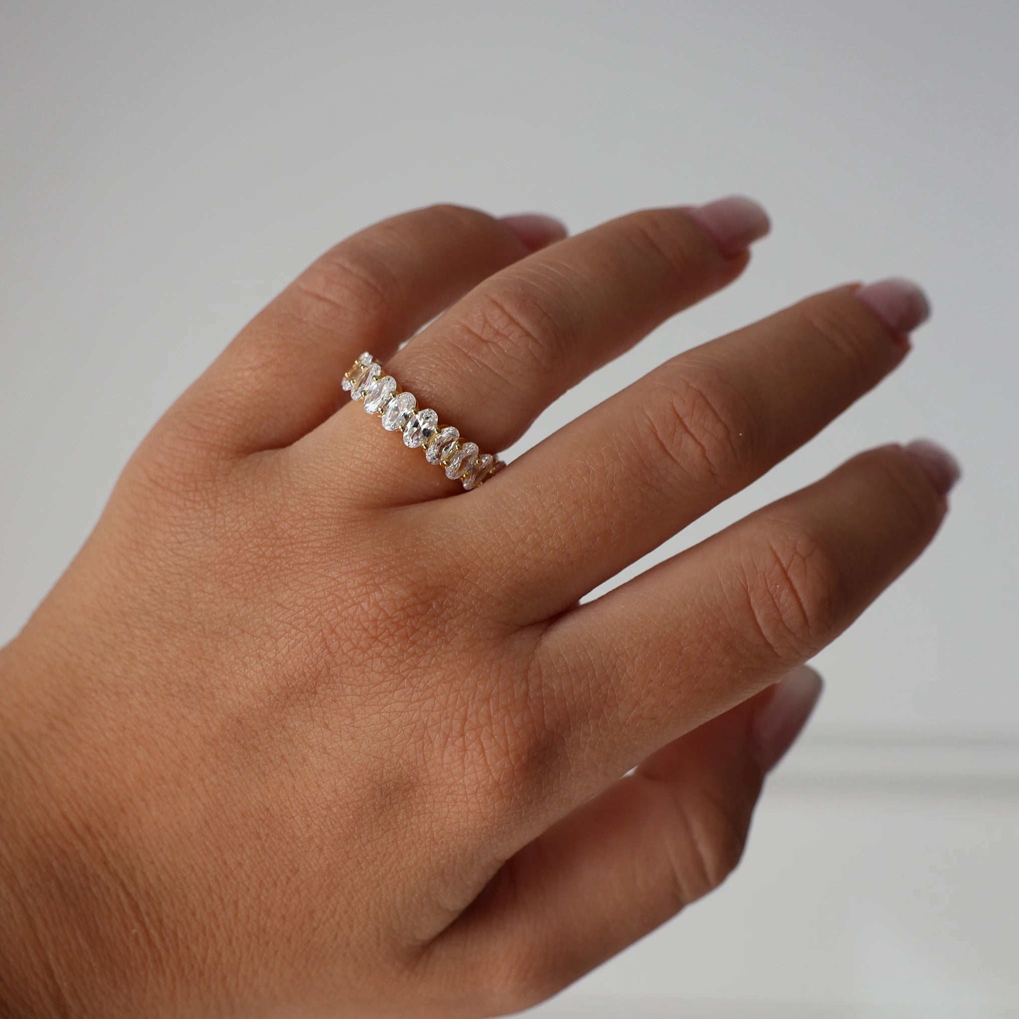 gold oval cubic zirconia eternity ring 5mm