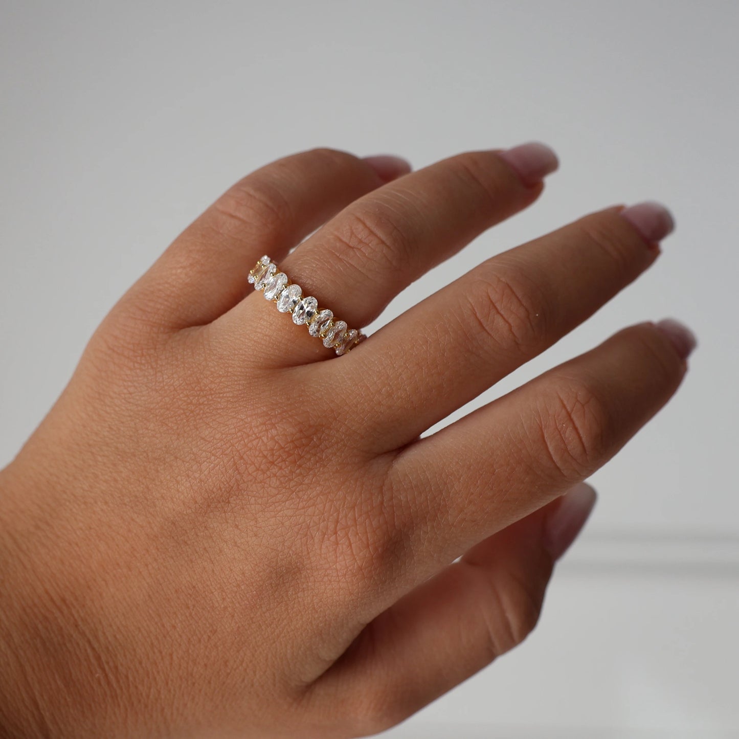 gold oval cubic zirconia eternity ring 5mm