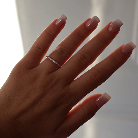 Half eternity moissanite ring in silver band