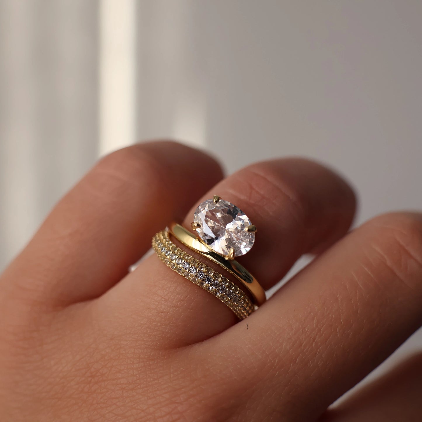 East west oval gold wedding band set