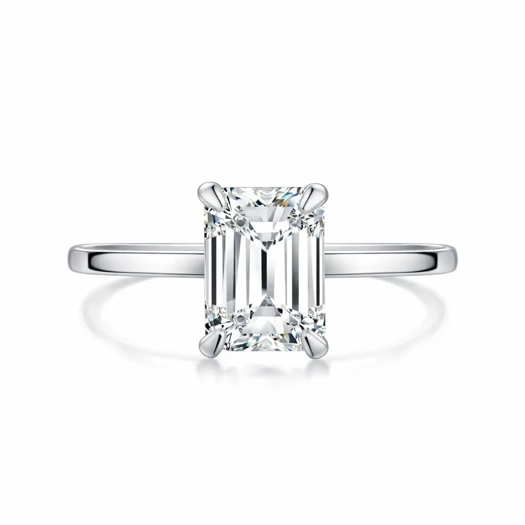 plain silver band with 2 carat emerald moissanite centre stone