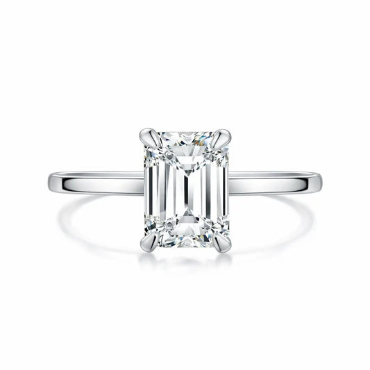 plain silver band with 2 carat emerald moissanite centre stone