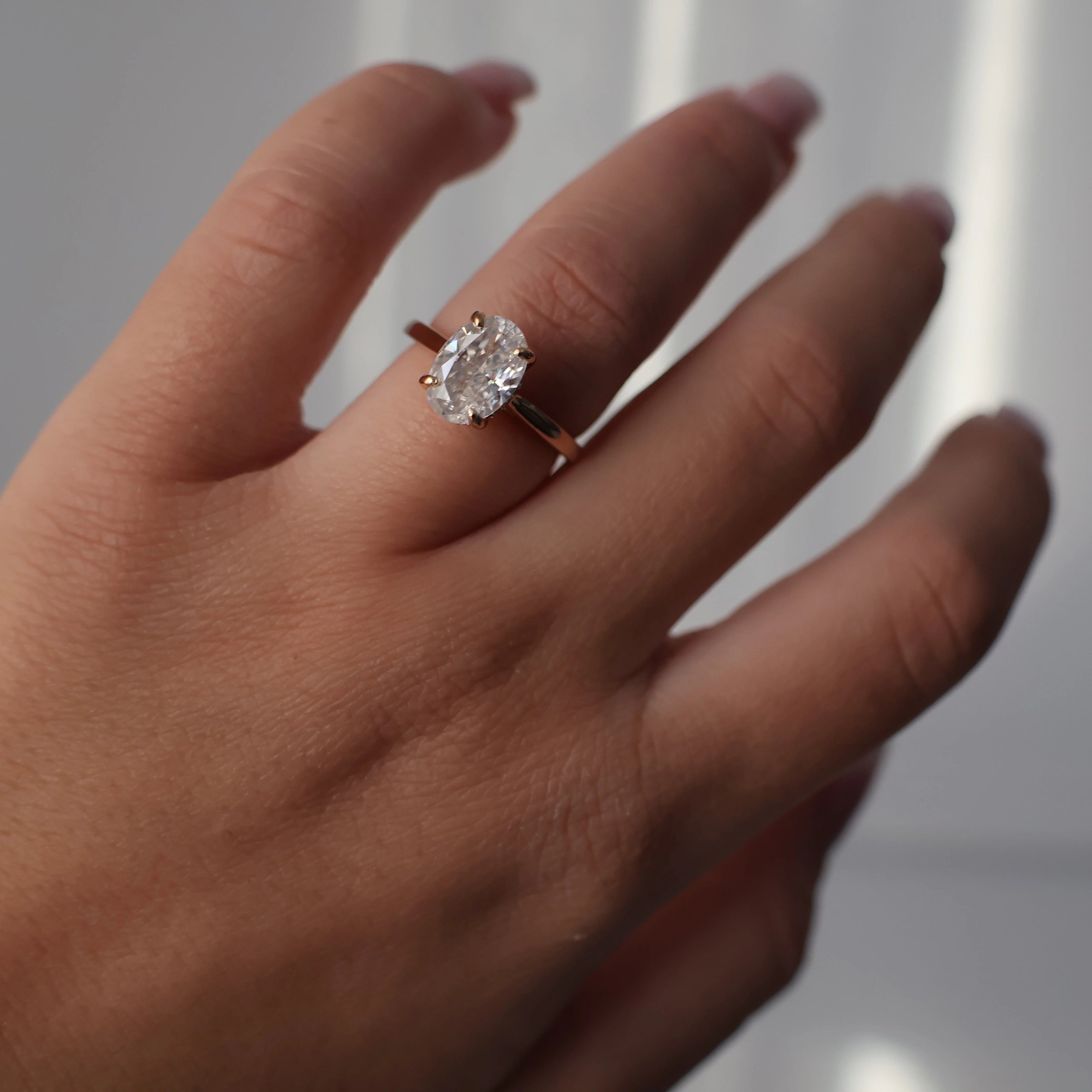 2.5 ct oval moissanite ring in 14k gold filled with hidden halo