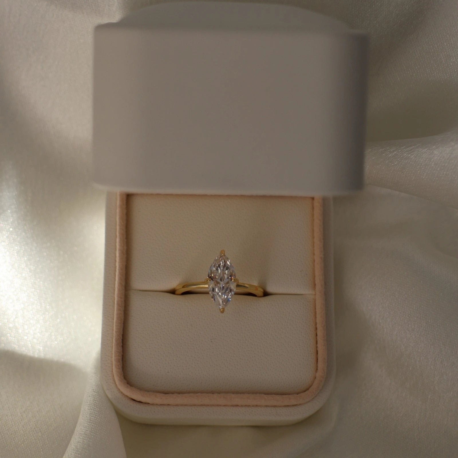 marquise CZ gold solitaire ring in proposal box