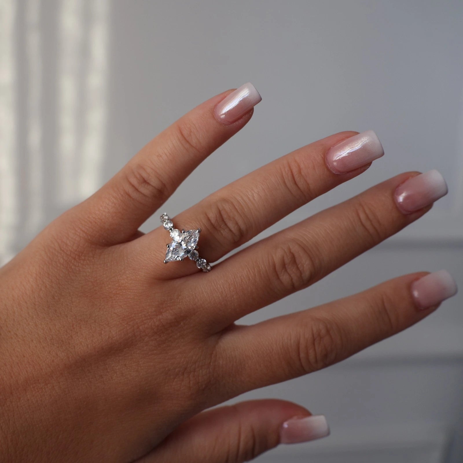 marquise ring in silver with round floating band
