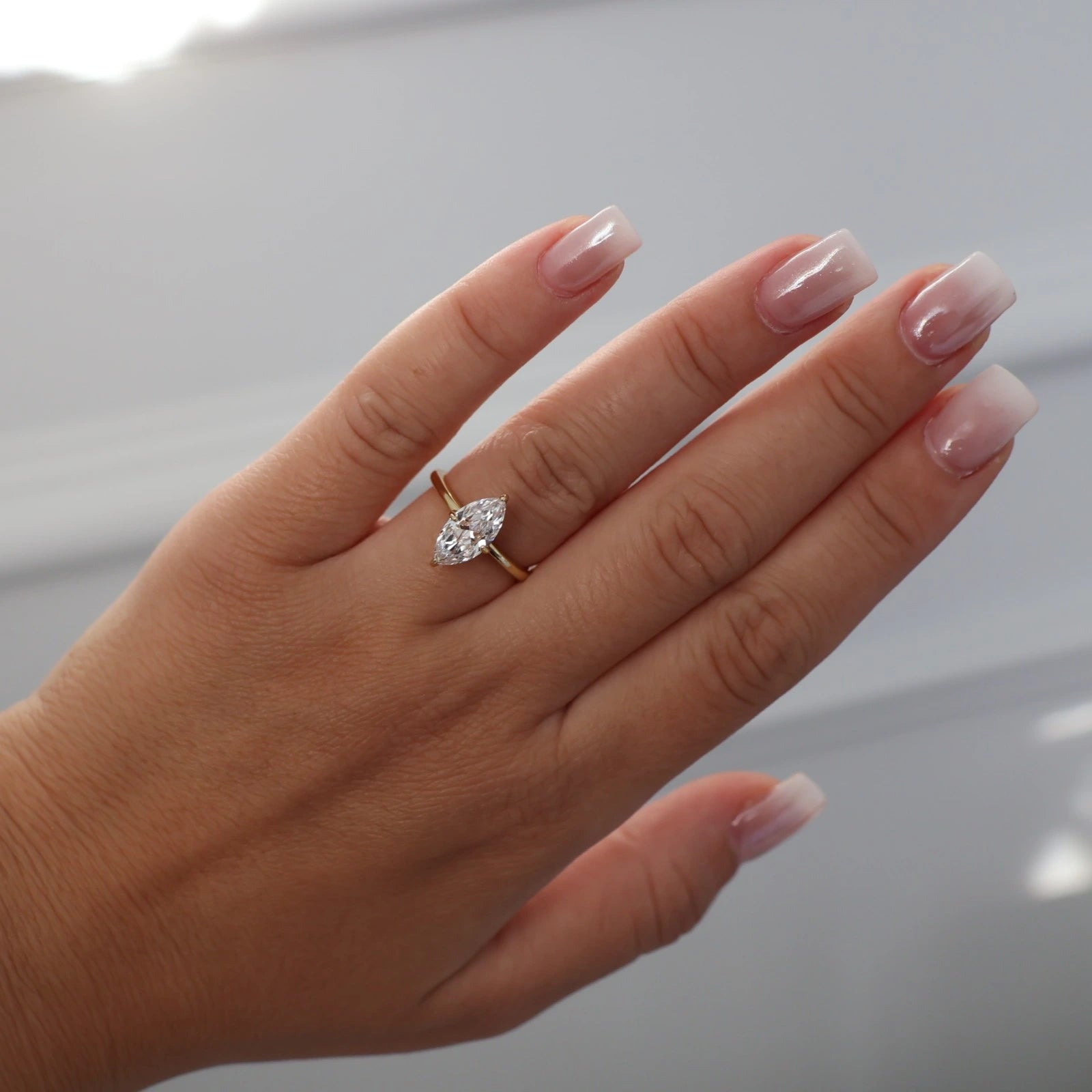 Marquise solitaire cubic zirconia engagement ring in gold