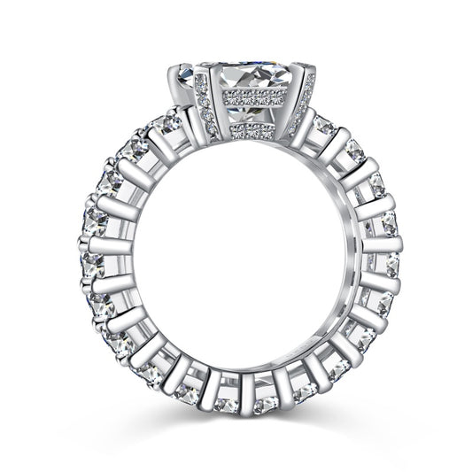 silver emerald ring with baguette side stones