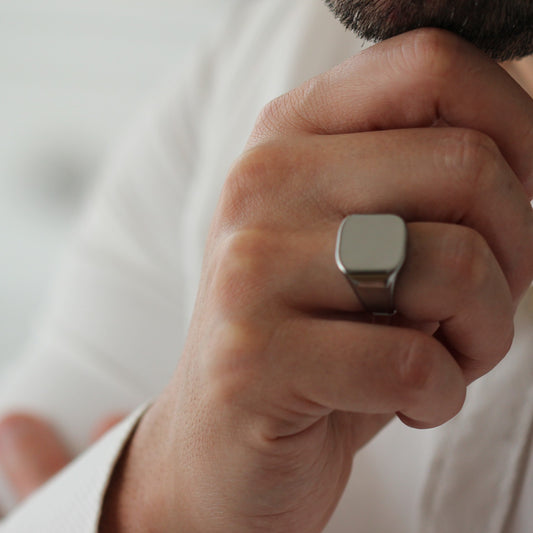 close up of mens silver signet ring