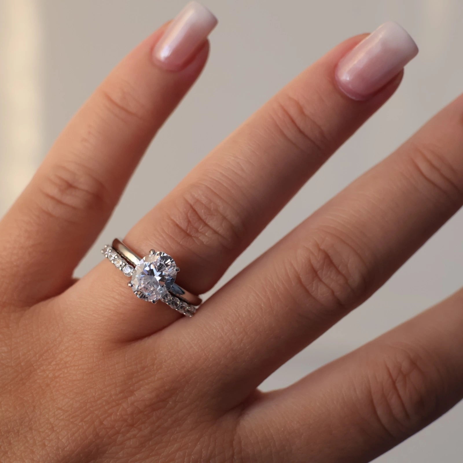 open pavé silver wedding band