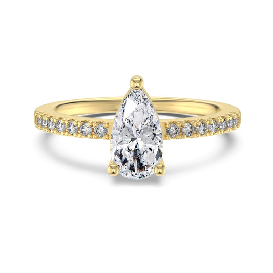 oslo pear ring with slim centre stone on half pave band