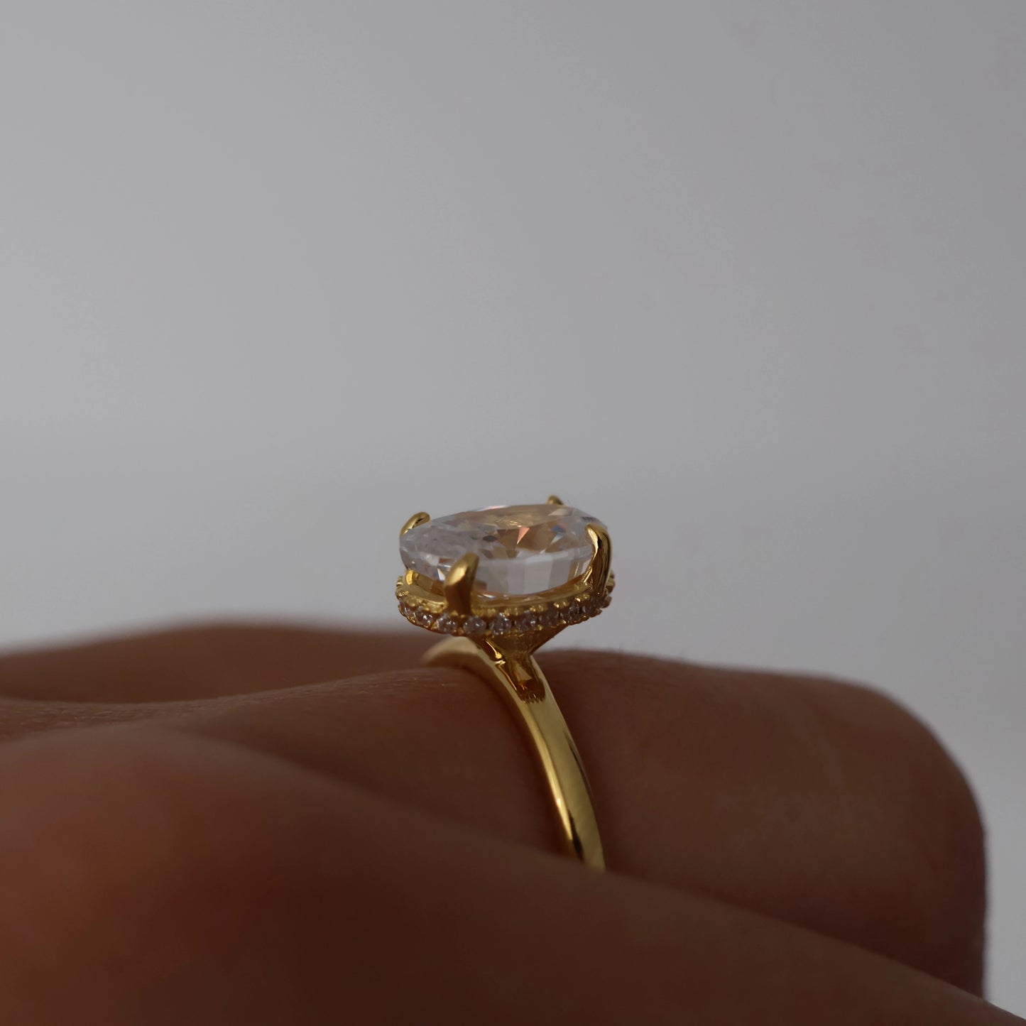 1.5 carat oval ring with hidden halo in gold