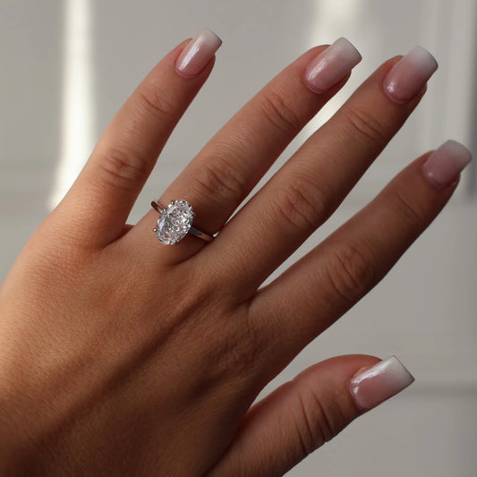 oval cut 3.5ct CZ silver ring featuring crushed ice stone