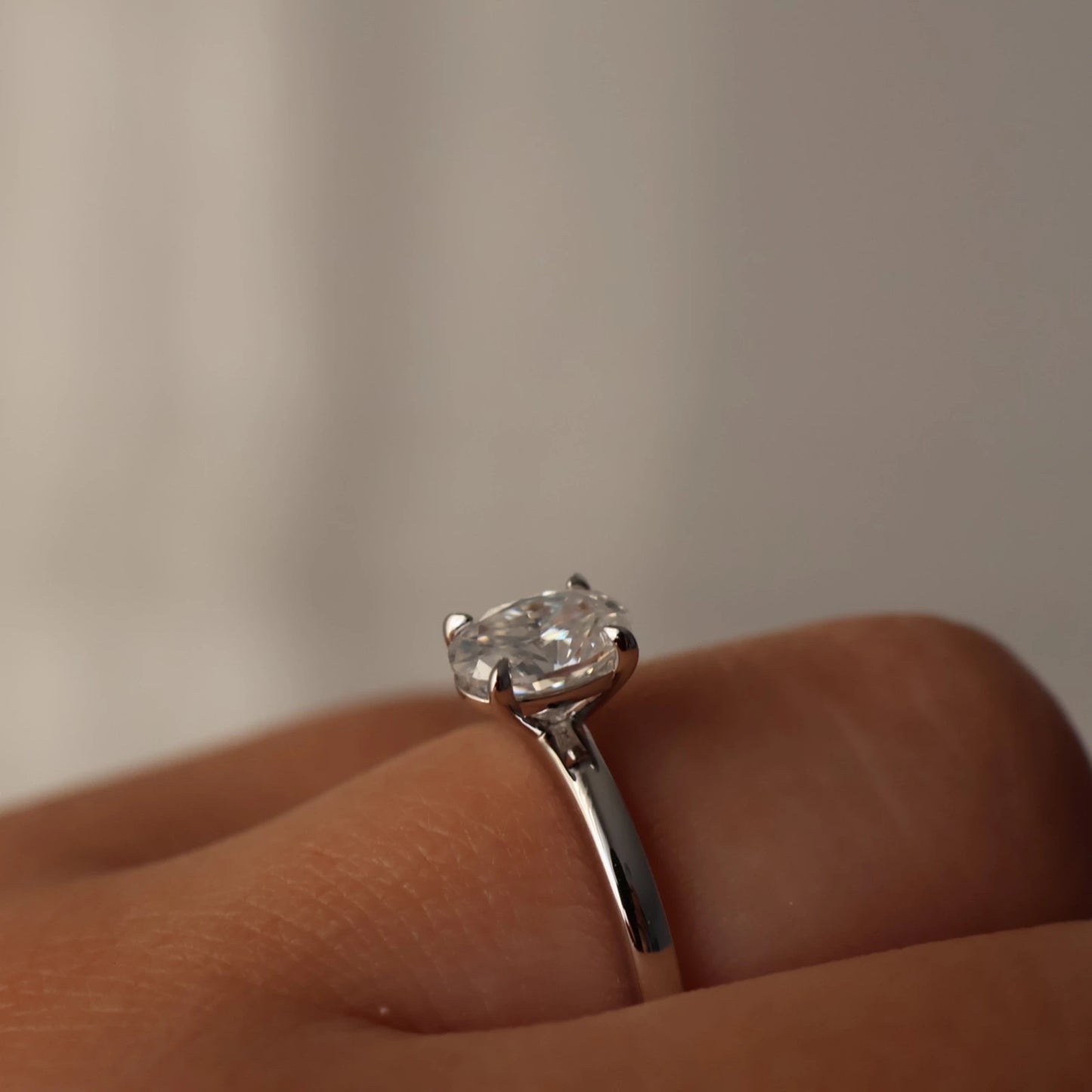 2ct oval cut moissanite ring with silver band