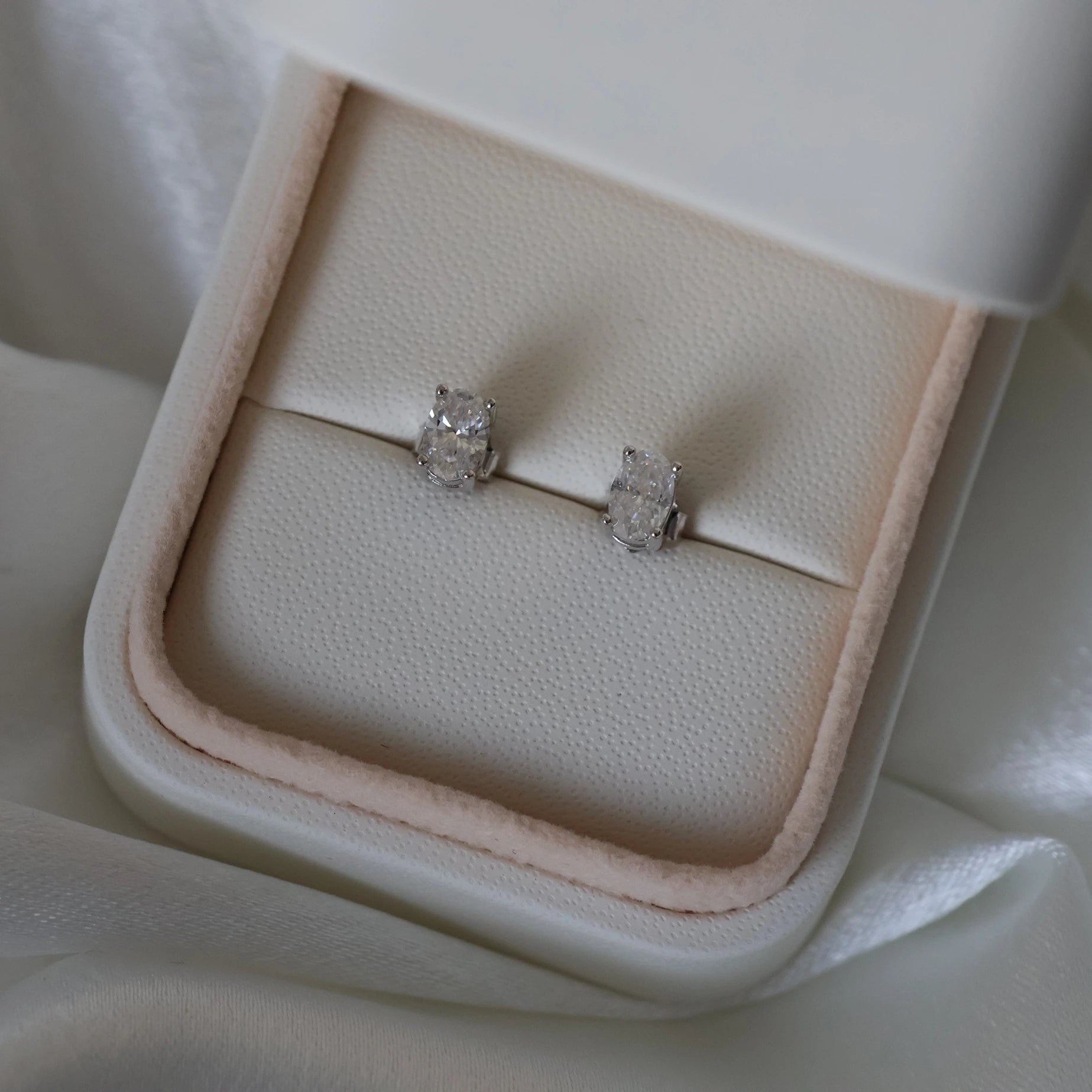 Oval moissanite stud earrings 1 TCW in silver