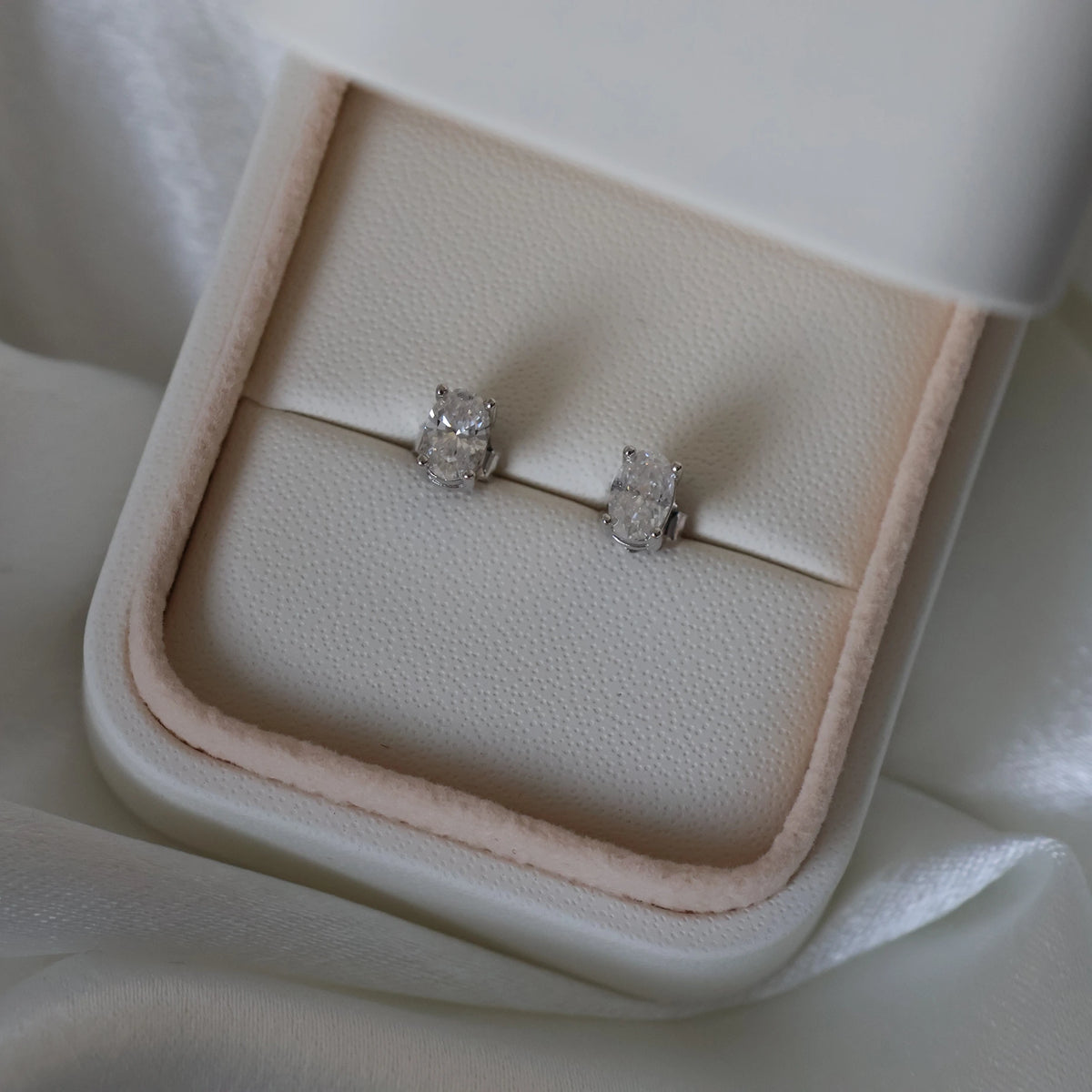 Oval moissanite stud earrings 1 TCW in silver