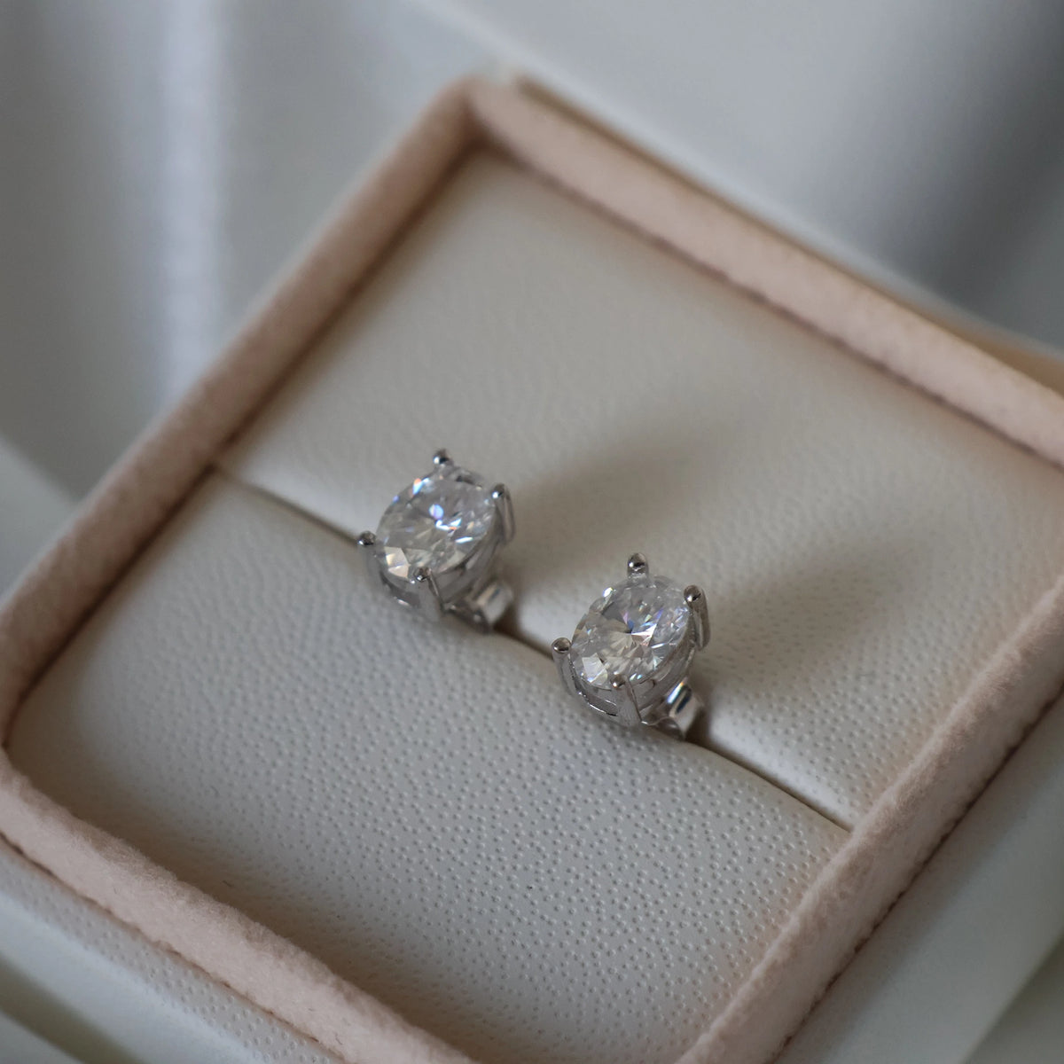 2 carat silver moissanite oval stud earrings in 925 silver