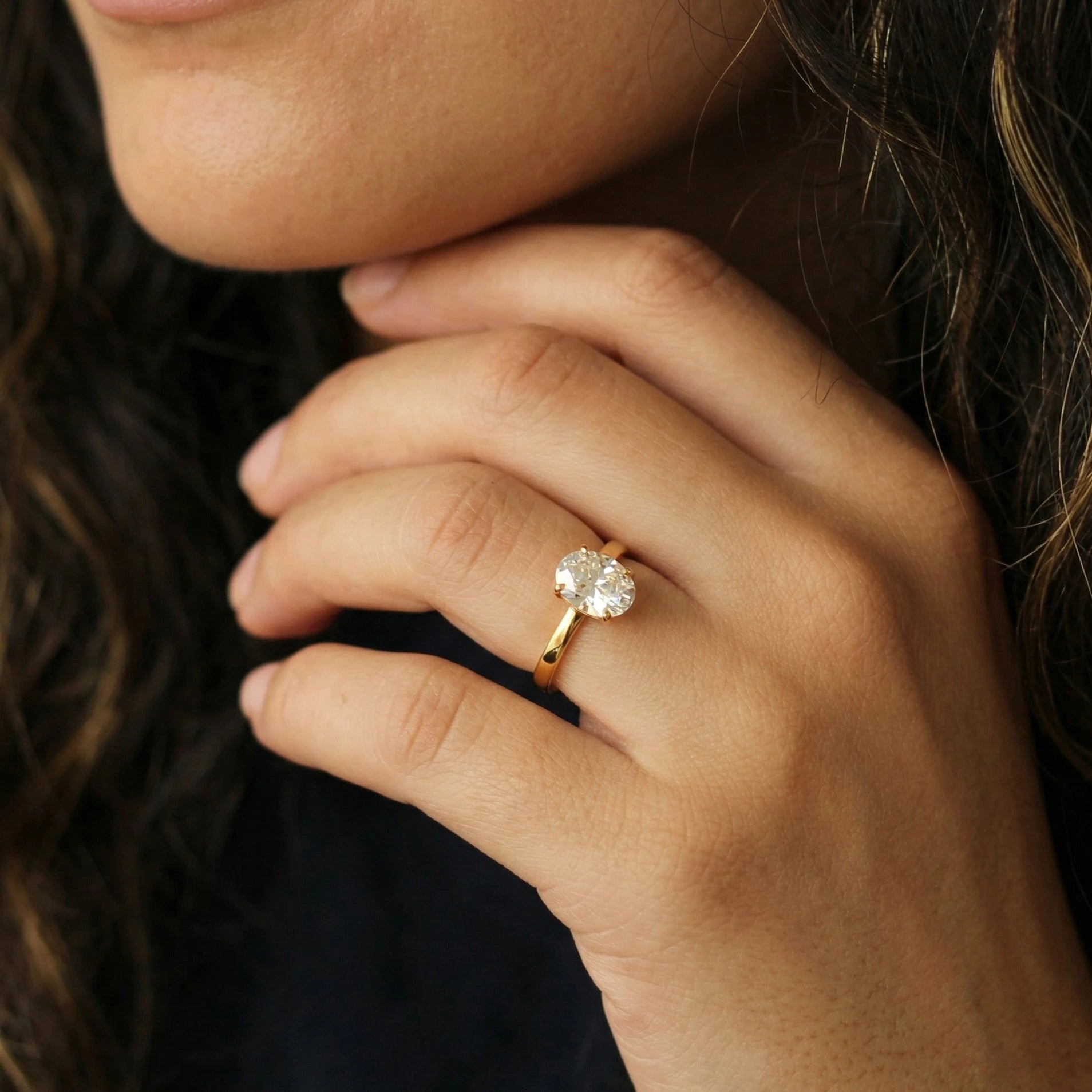 oval moissanite ring featuring a 2ct centre stone in 14k gold filled