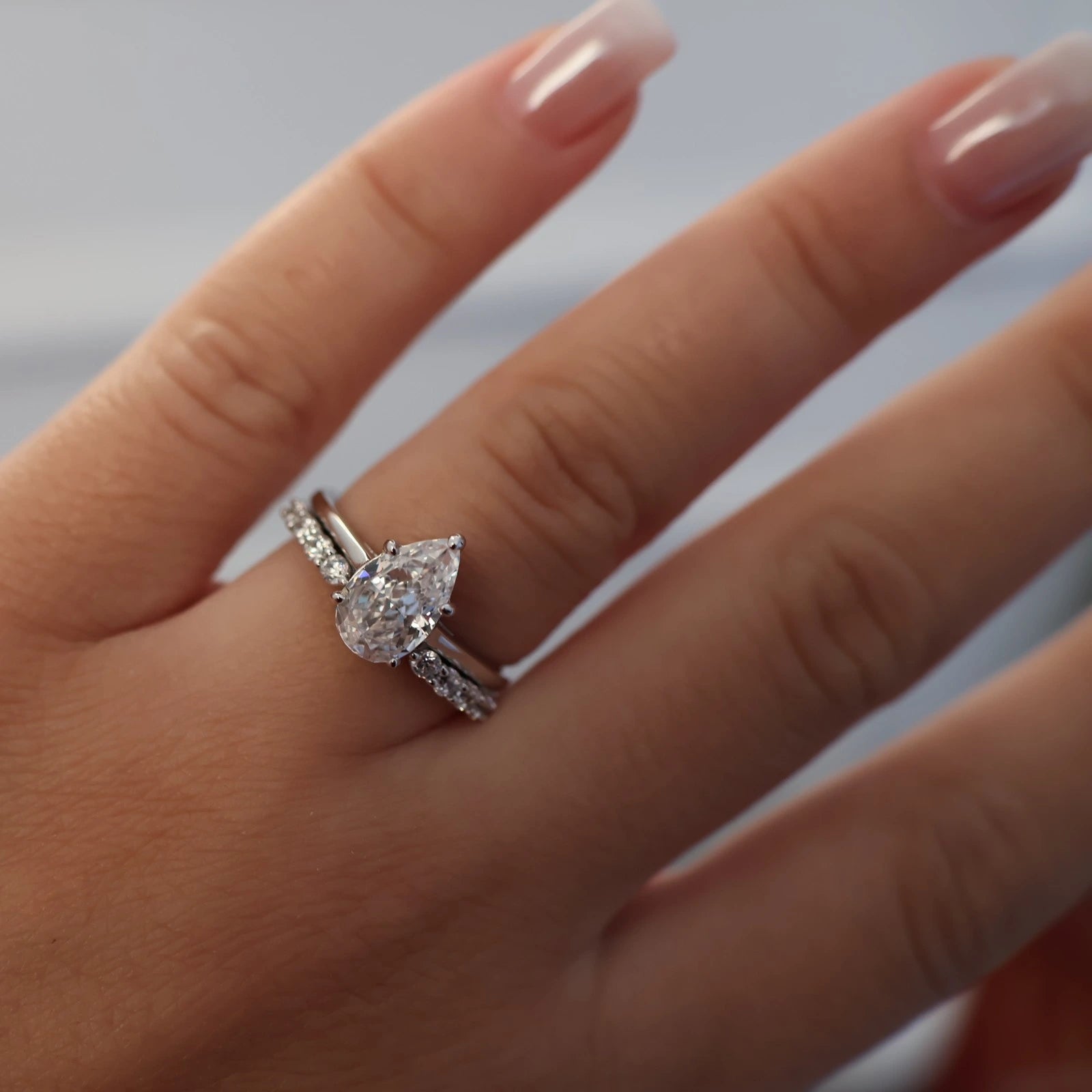 open pavé silver wedding band