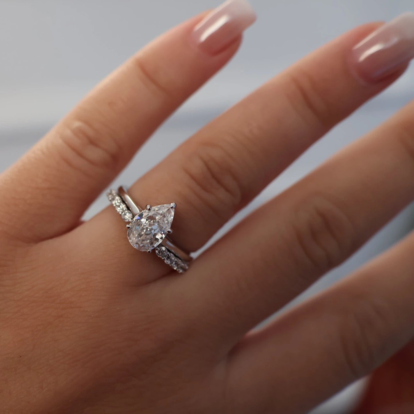 open pavé silver wedding band
