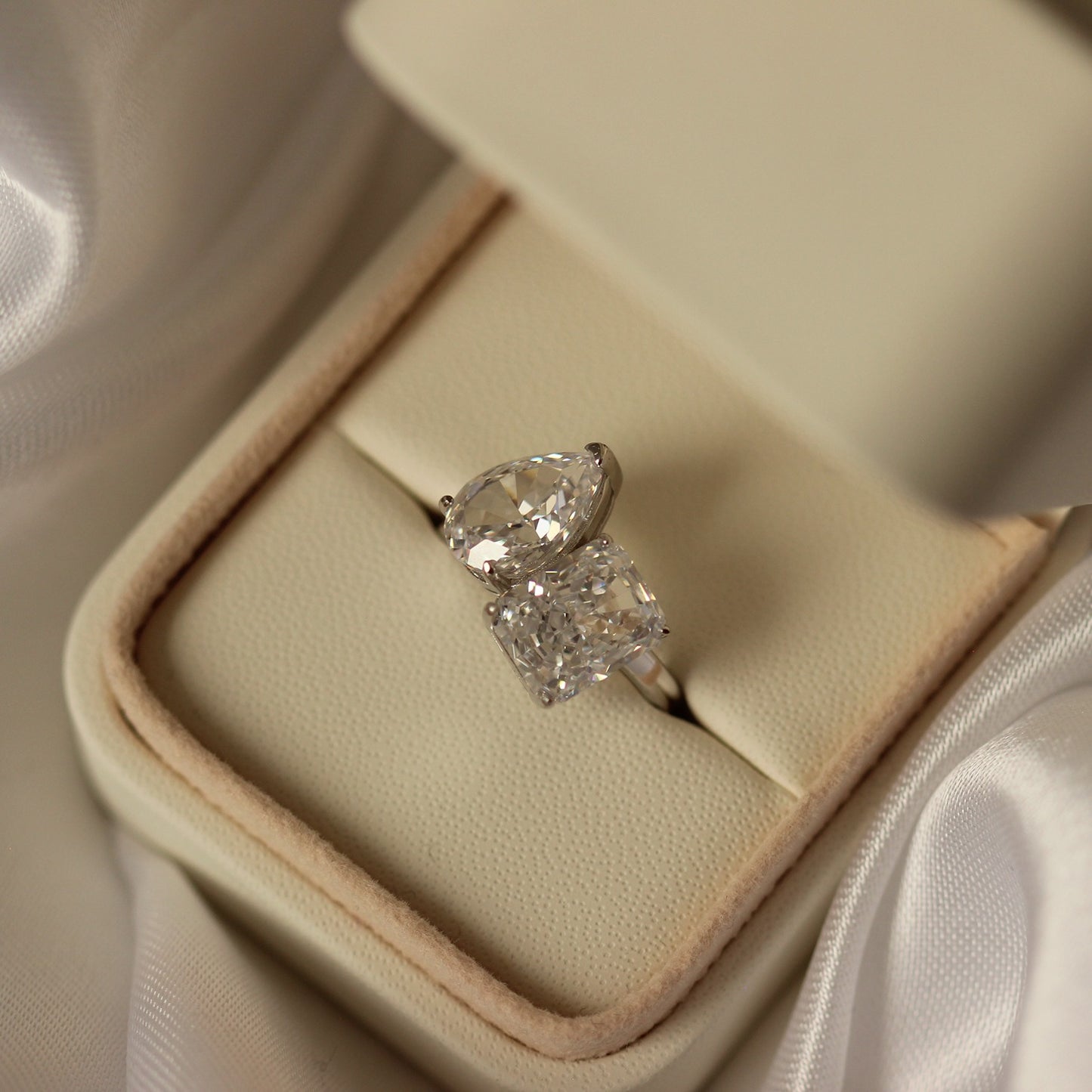 pear and radiant cut toi et moi dupe engagement ring