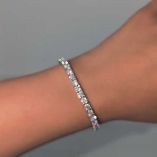 4mm moissanite tennis bracelet in silver on models hand
