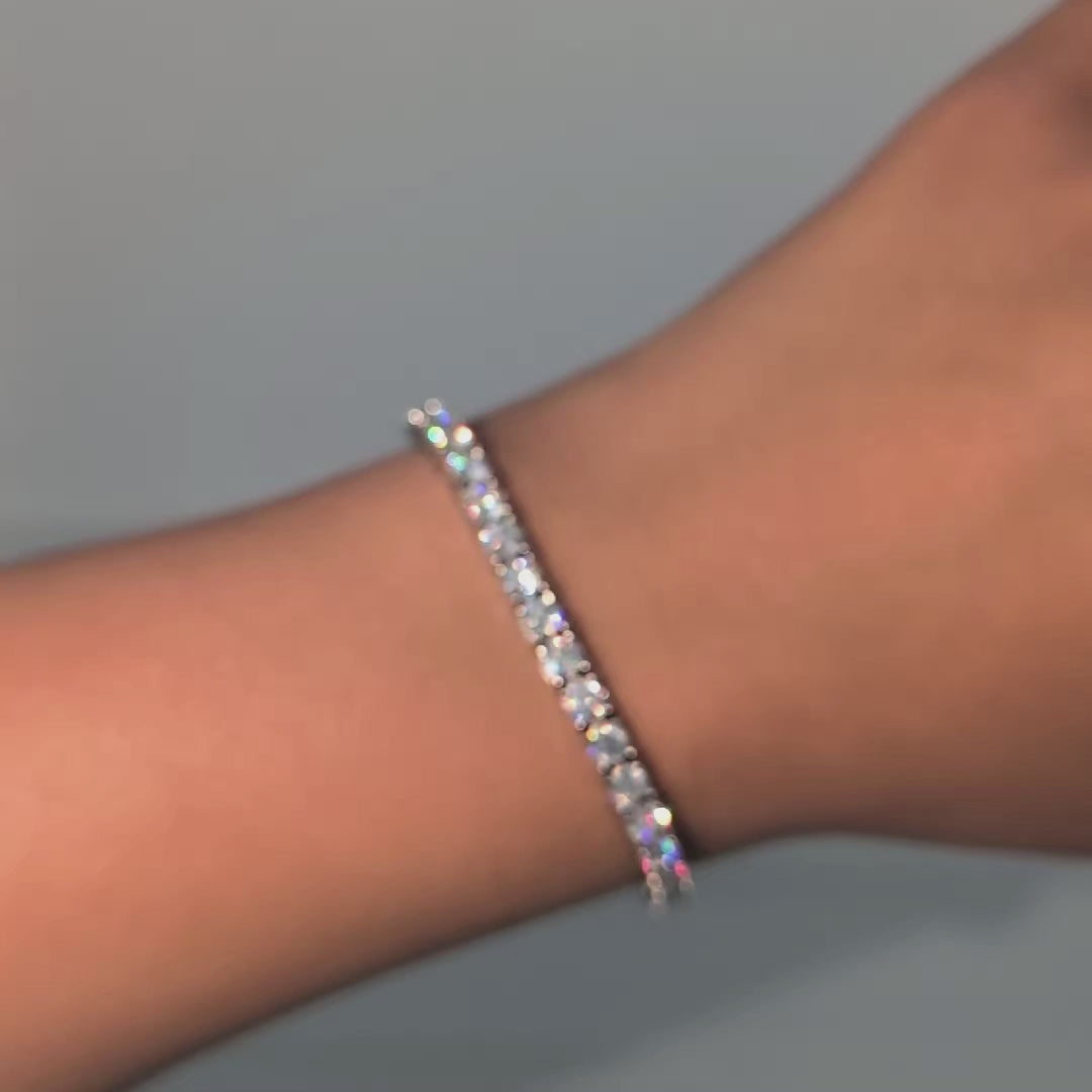 4mm moissanite tennis bracelet in silver on models hand