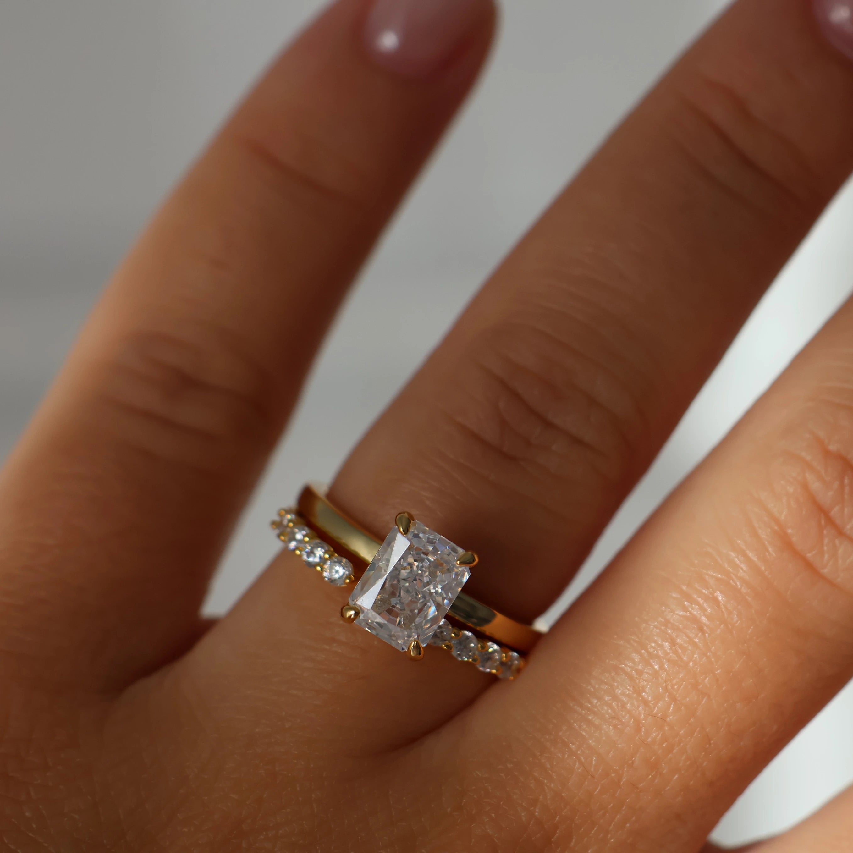 radiant cut cubic zirconia solitaire ring in 18k gold plating