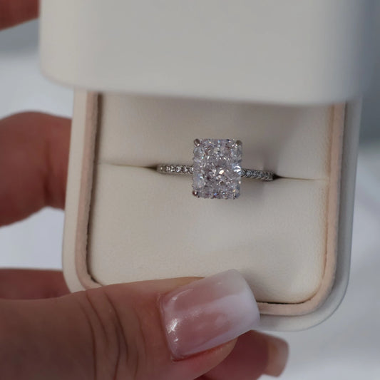 3.5 carat radiant cut CZ ring with pavé band in proposal box