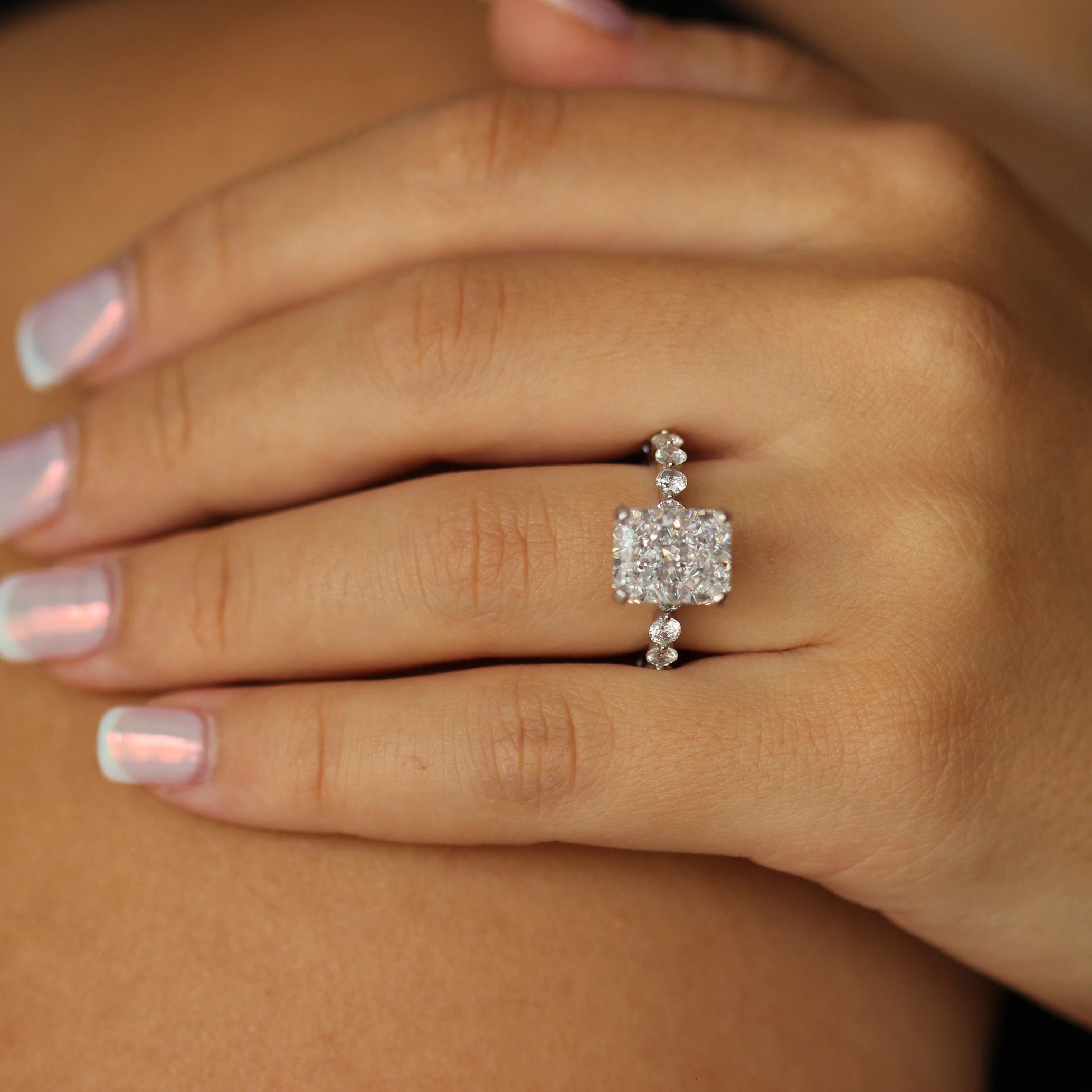 radiant cut ring with large cz stone centre