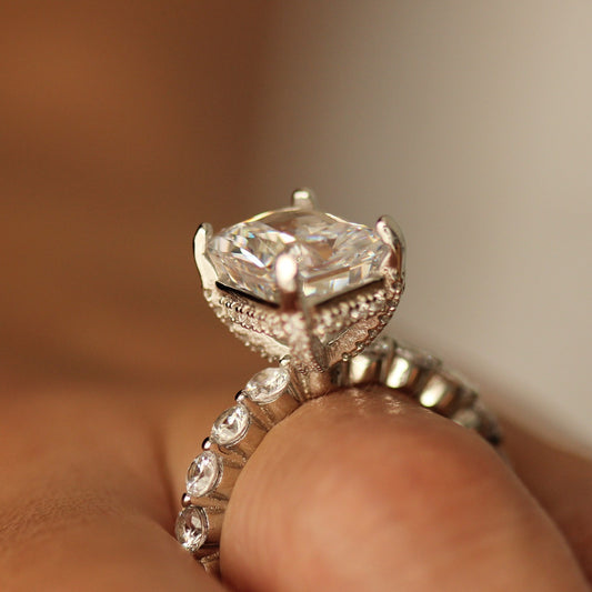 radiant cut ring with large cz stone centre on hand side profile