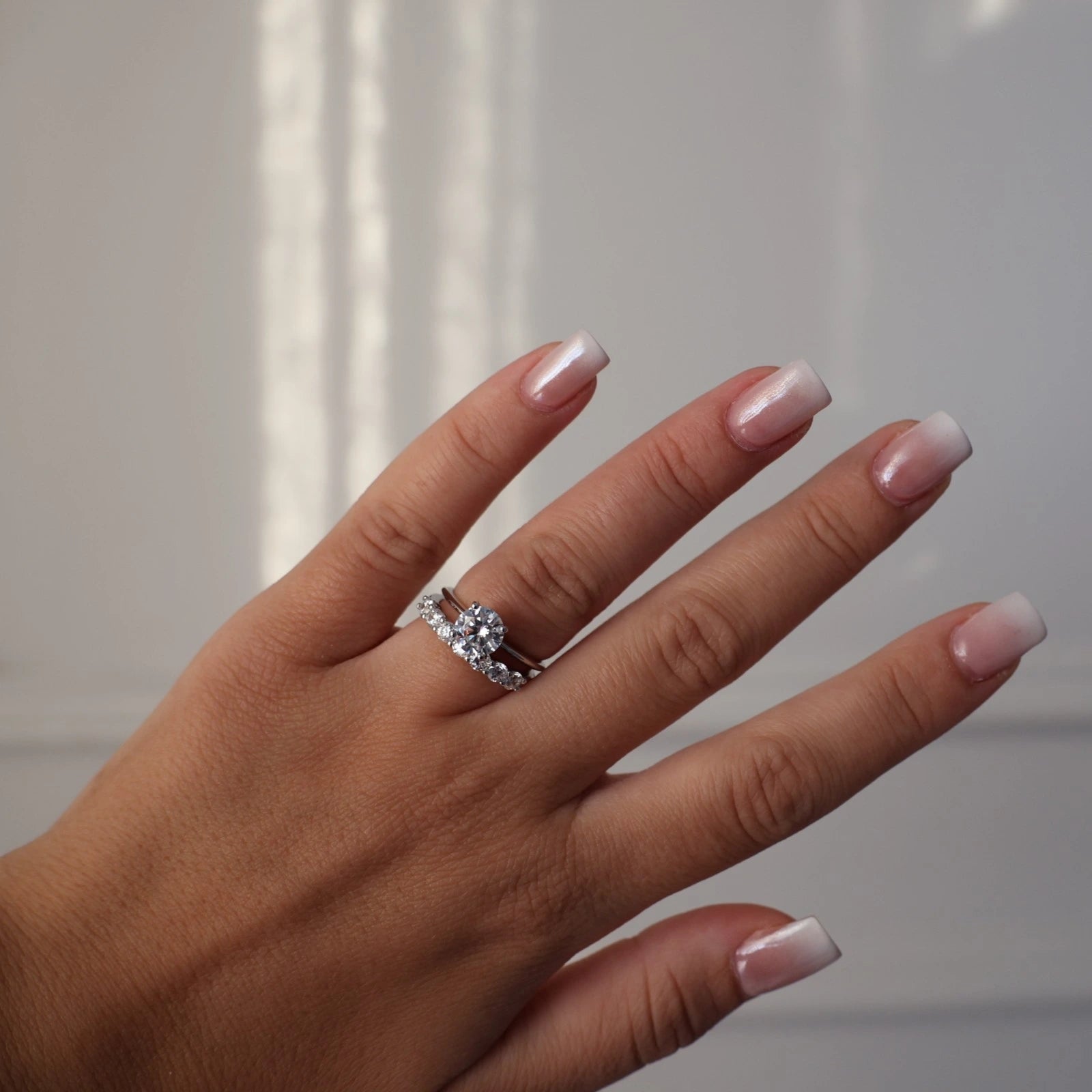 round solitaire ring with round eternity band in silver