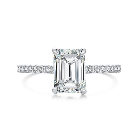 seoul emerald moissanite ring on half pave band