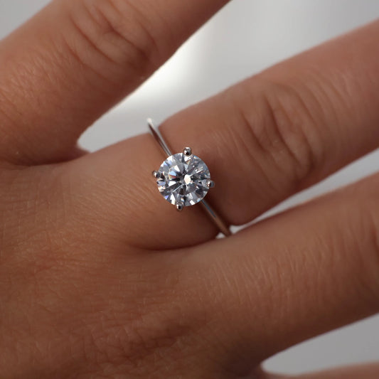 1.3 ct round cut solitaire ring in silver thin band