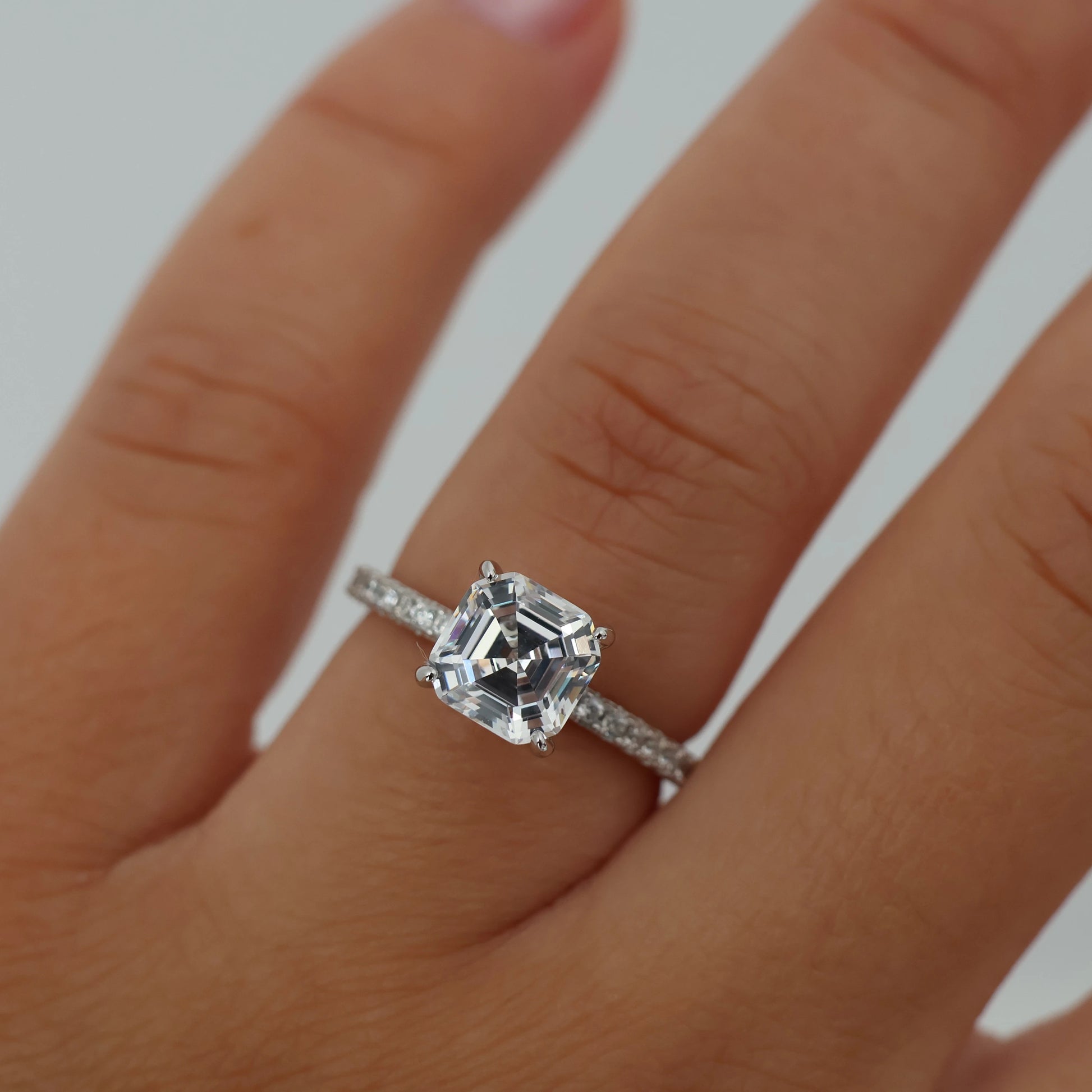 2 carat asscher cut cubic zirconia ring with a pavé band