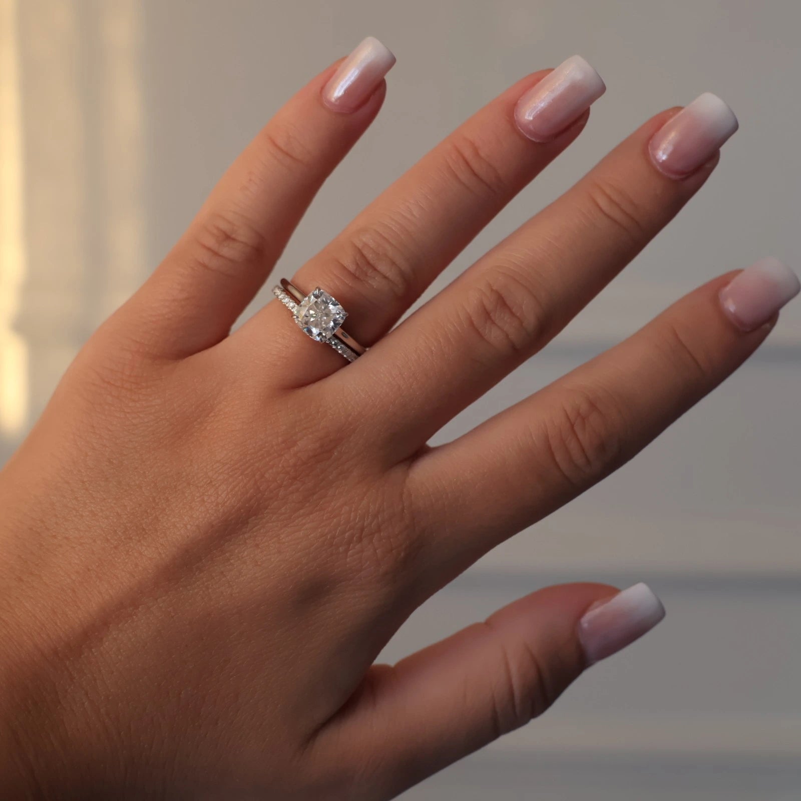 Silver 2 carat cushion moissanite engagement ring in solitaire