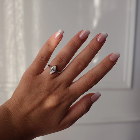 Silver solitaire ring with 2 carat marquise moissanite
