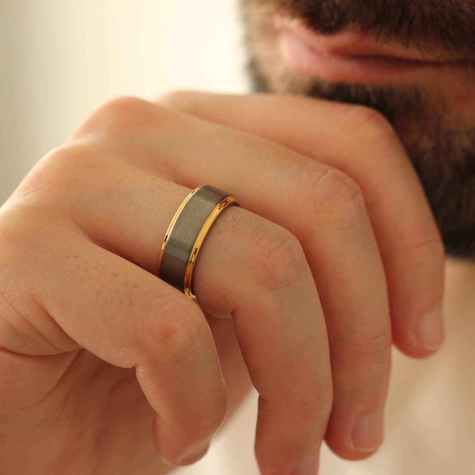Male model chin pose wearing Silver and Gold Men’s Ring 8mm 
