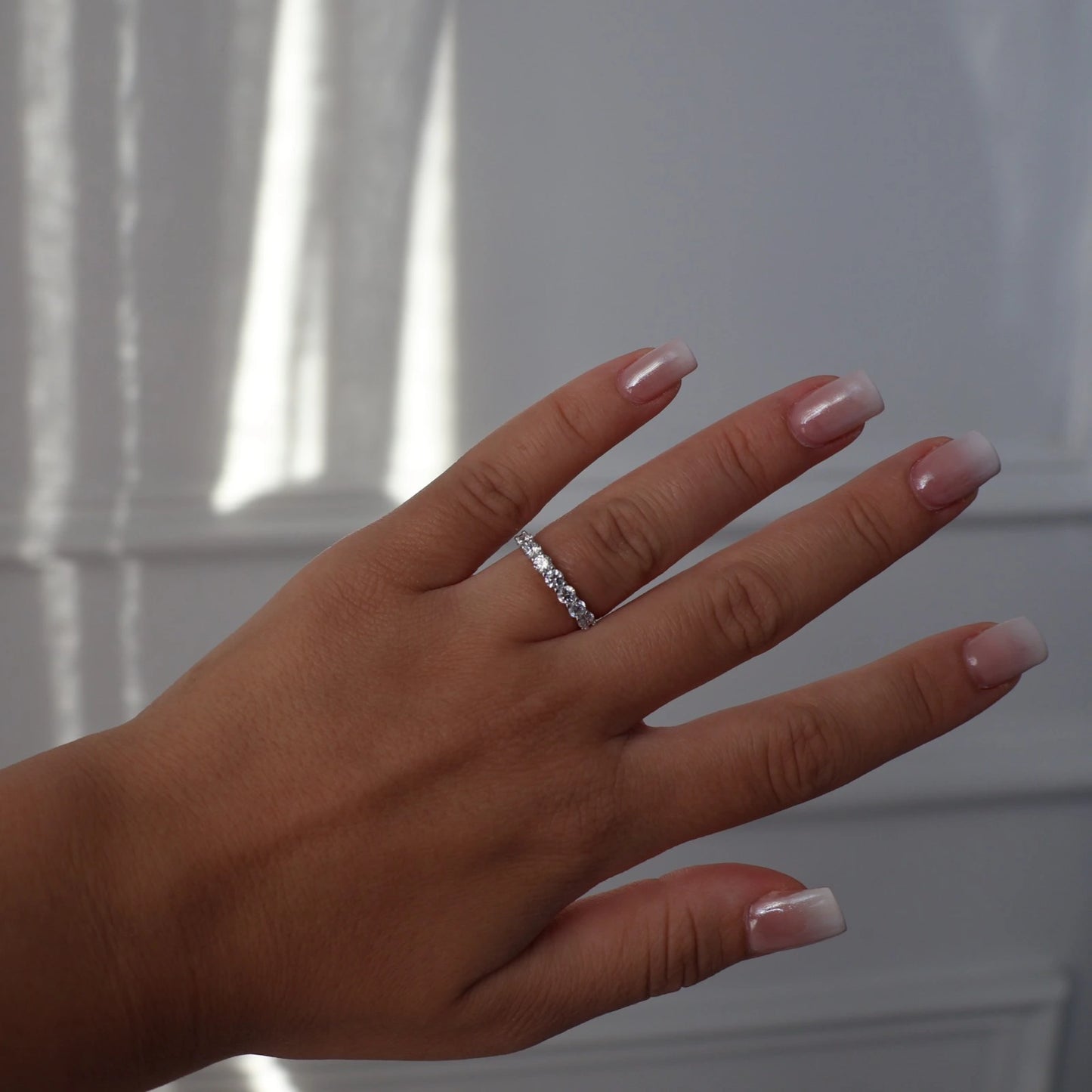 silver round floating wedding band