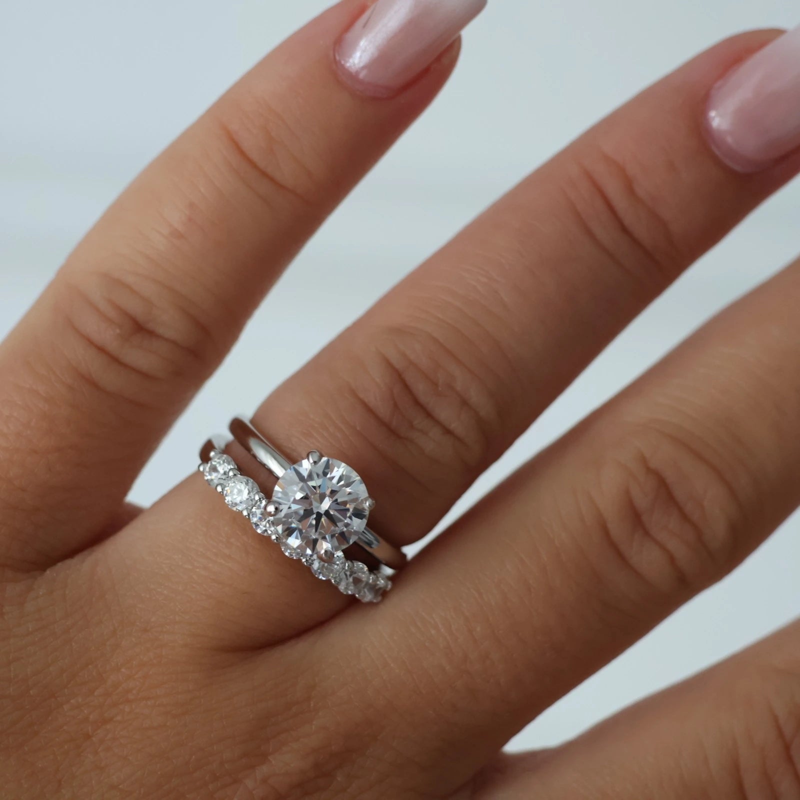 Silver floating round wedding ring