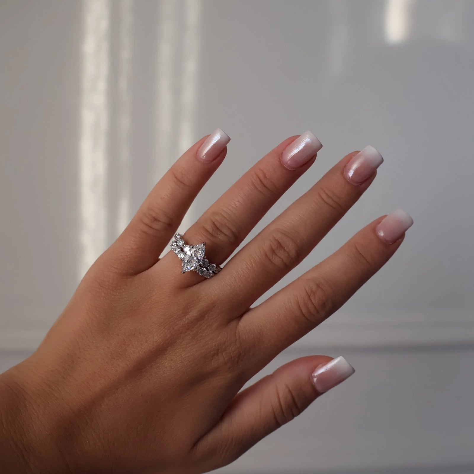 silver marquise cut ring paired with round floating band