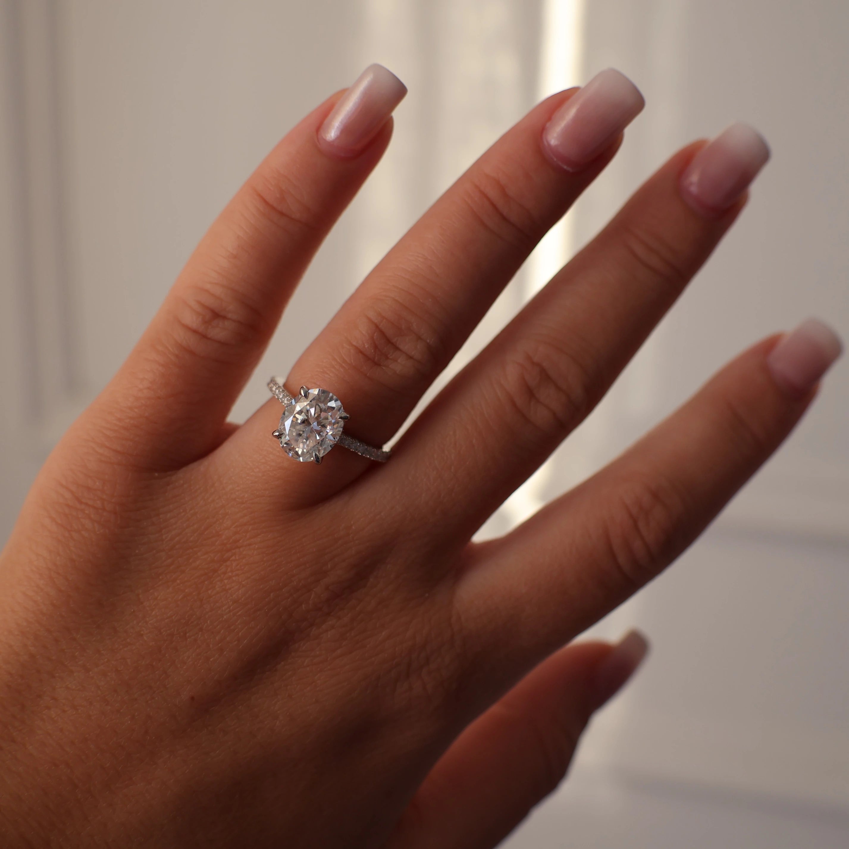 Silver oval cut 3ct moissanite engagement ring pave band