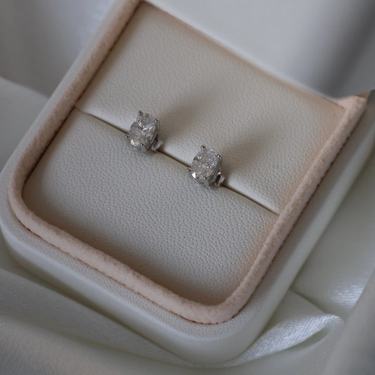 silver oval moissanite stud earrings with 1 TCW total weight