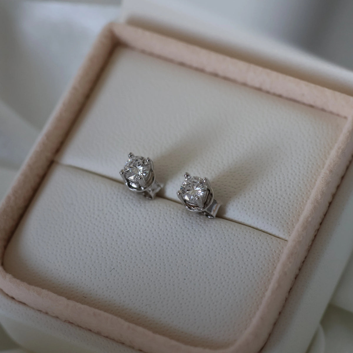 Small silver round moissanite studs